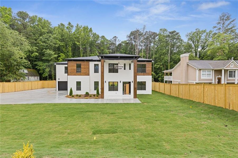 Front exterior of a new home in , Lilburn, GA, highlighting curb appeal (Image 31).