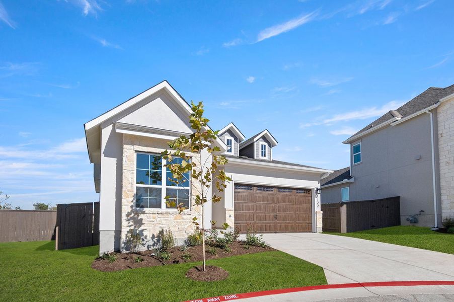 Front exterior of a new home in Cross Creek, Cedar Park, TX, highlighting curb appeal (Image 17).