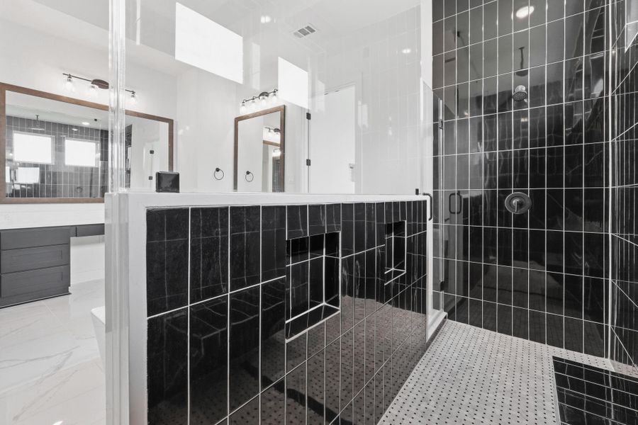 Primary en-suite with separate walk-in shower and tub