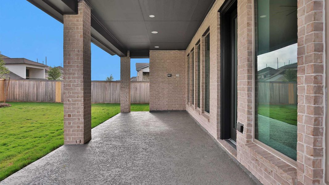 Exterior details and patio area of a home in Bridgeland, Cypress (Image 3).