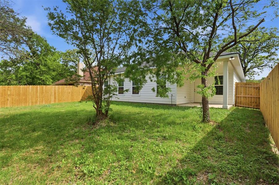Exterior details and patio area of a home in , Fort Worth (Image 3). Exterior details and patio area of a home in , Fort Worth (Image 3).