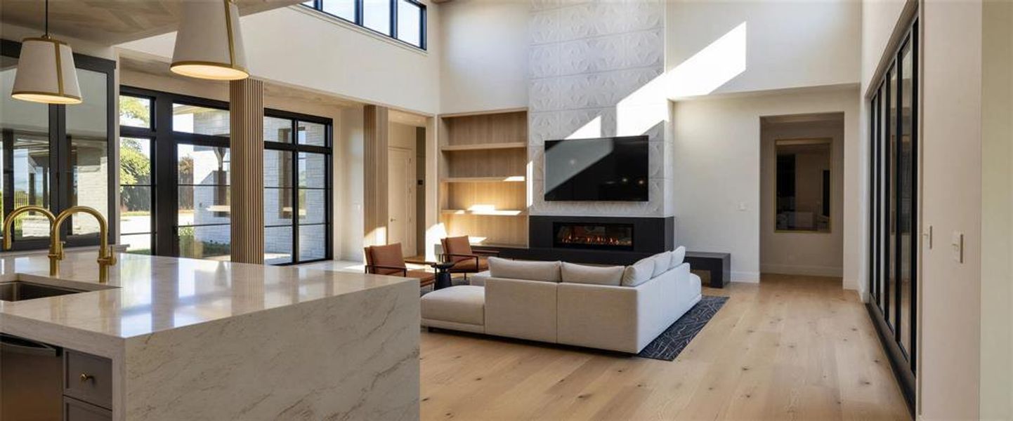 Kitchen featuring light stone countertops