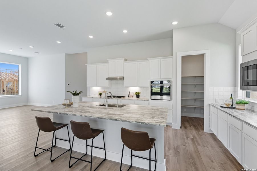 Furnished interior view inside a new home in Prominence, San Antonio (Image 9).