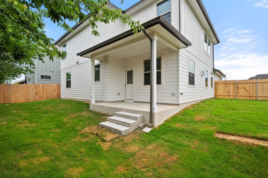 Front exterior of a new home in The Hills of Bear Creek, Manchaca, TX, highlighting curb appeal (Image 40).