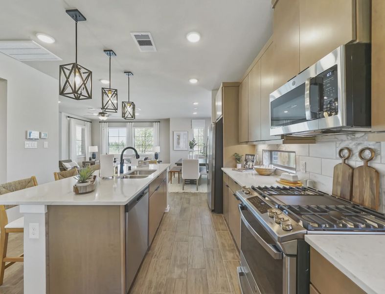 Representative furnished interior of a home built from the Riverdale by Chesmar Homes in Sienna Courtyard, Missouri City (Image 5).