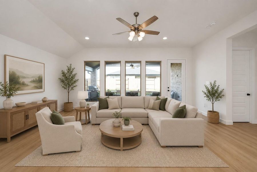 *VIRTUALLY STAGED* Spacious open living room area connected to the kitchen