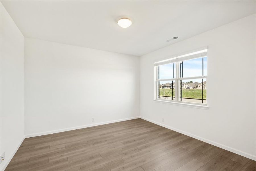 Spacious, unfurnished interior of a new home in East Oak Creek Elements, Commerce (Image 17).