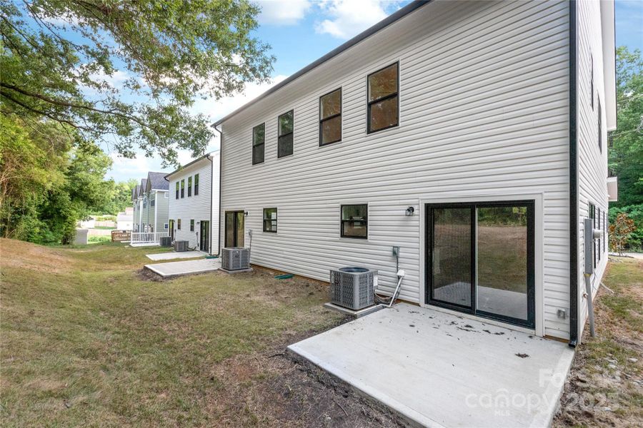 Front exterior of a new home in , Charlotte, NC, highlighting curb appeal (Image 20).