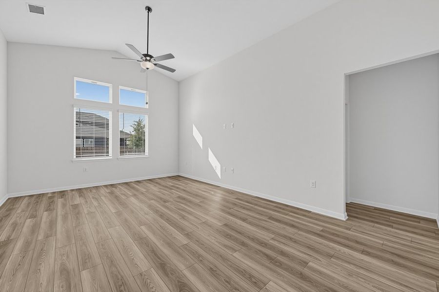 Representative unfurnished interior of a home built from the Warbler by Taylor Morrison in Longview, Del Valle (Image 9).