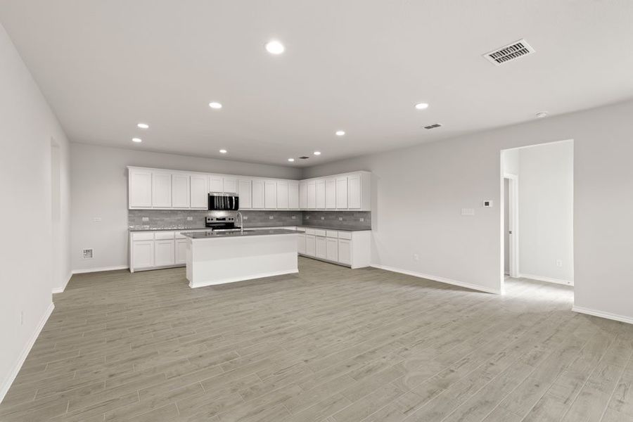 Representative exterior photo of a completed home built from the Phoenix by Impression Homes in Keeneland, Aubrey, TX (Image 7). Representative exterior photo of a completed home built from the Phoenix by Impression Homes in Keeneland, Aubrey, TX (Image 7).