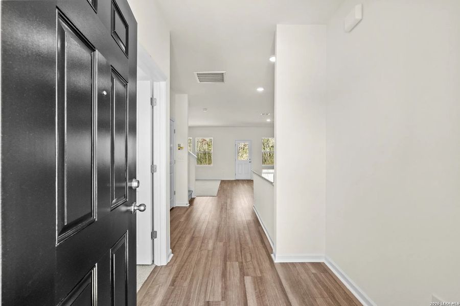 Spacious, unfurnished interior of a new home in Sutton Farms, San Antonio (Image 13).