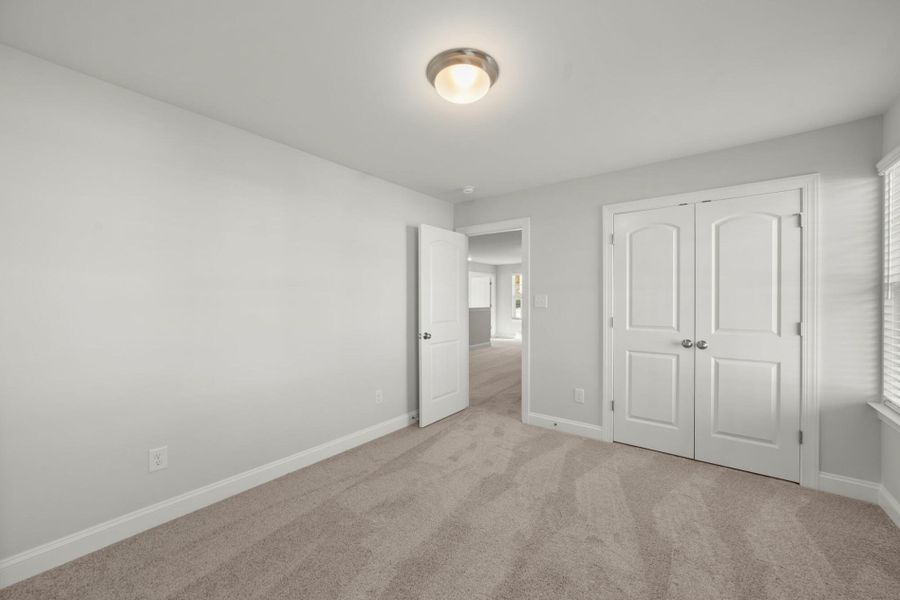 Spacious, unfurnished interior of a new home in Cottages at Piper Village, Trinity (Image 32).