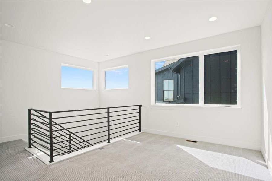 Spacious, unfurnished interior of a new home in West Grange, Longmont (Image 24).