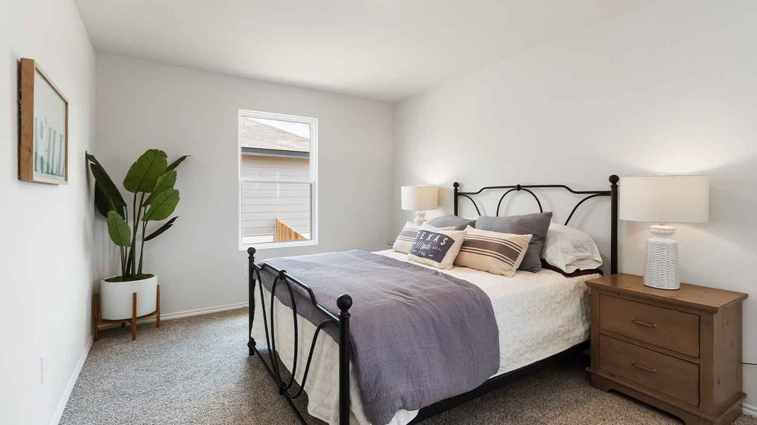 Representative furnished interior of a home built from the Atlanta by D.R. Horton in Watermark, Alvin (Image 11).