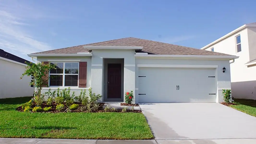 Front exterior of a new home in Wynnstone, Davenport, FL, highlighting curb appeal (Image 1). Front exterior of a new home in Wynnstone, Davenport, FL, highlighting curb appeal (Image 1).