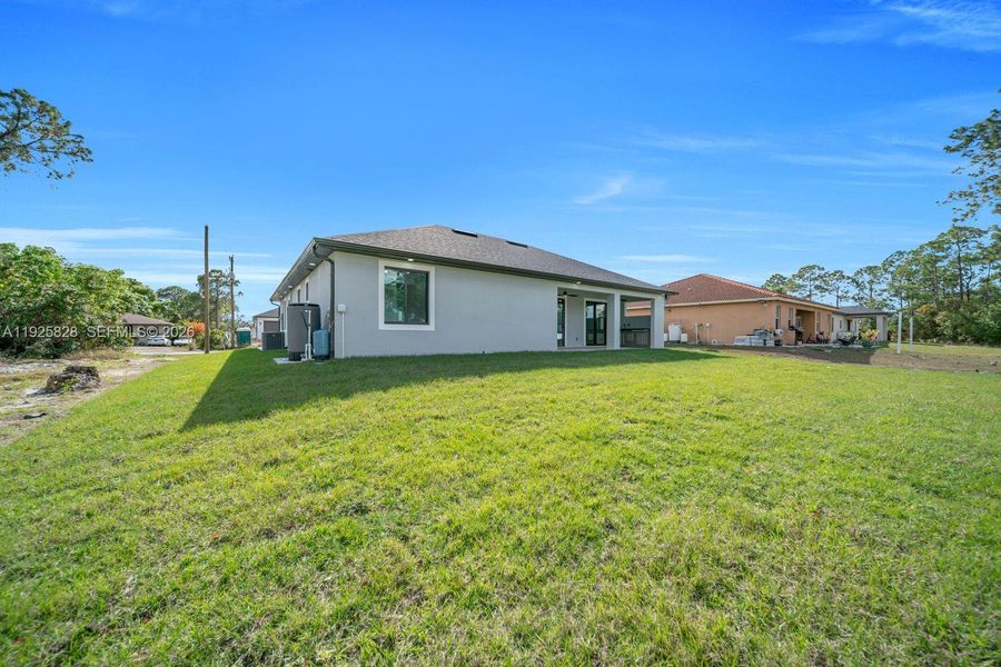 Exterior details and patio area of a home in , Lehigh Acres (Image 26). Exterior details and patio area of a home in , Lehigh Acres (Image 26).