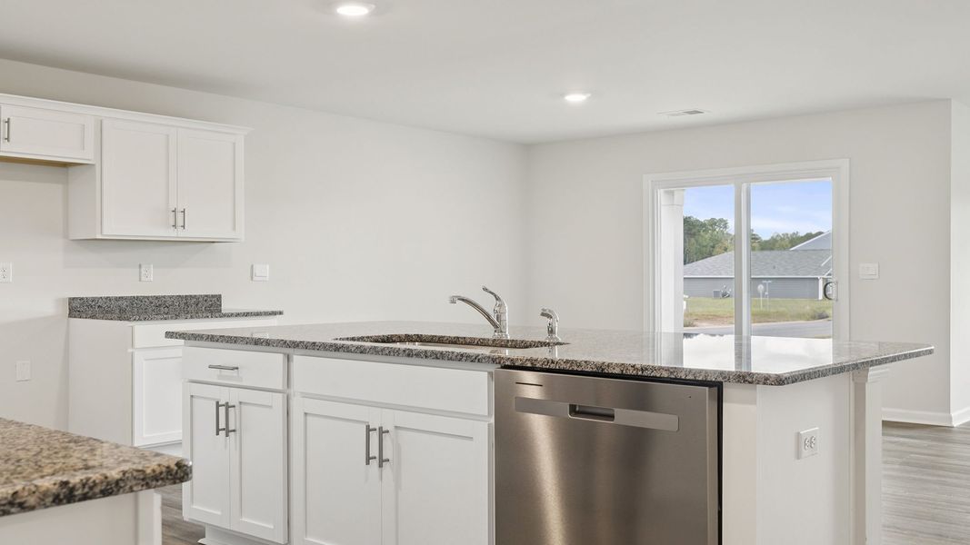 Furnished interior view inside a new home in Bentley Park, Greenwood (Image 8).