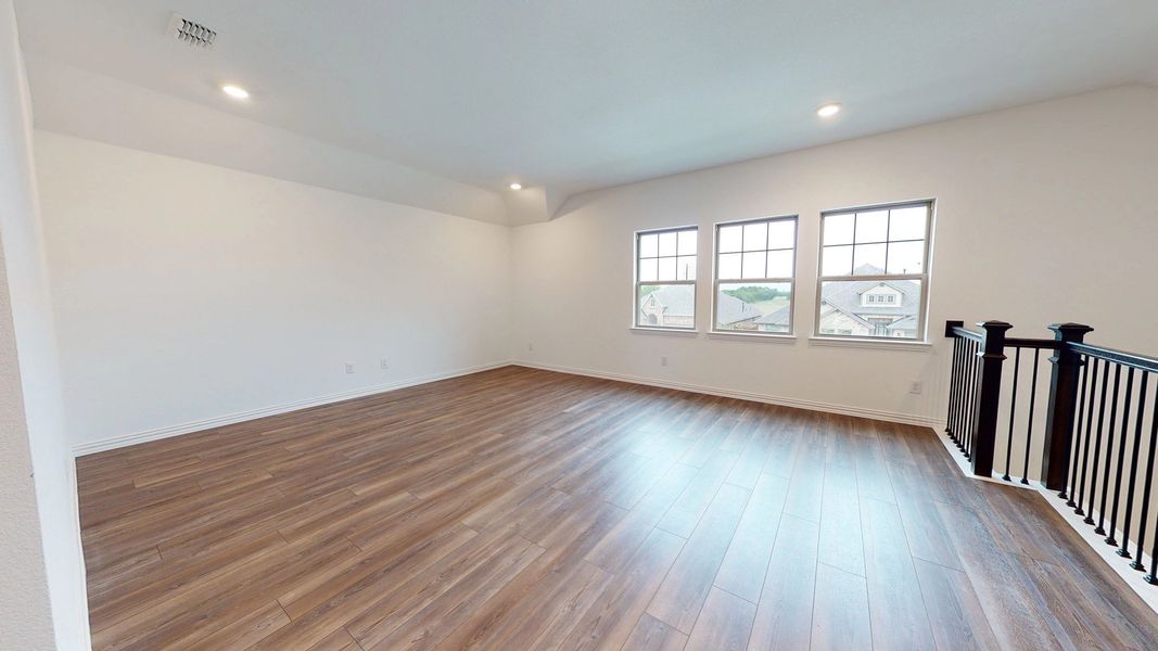 Representative unfurnished interior of a home built from the Sterling by Ashton Woods in Gateway Parks, Forney (Image 13).
