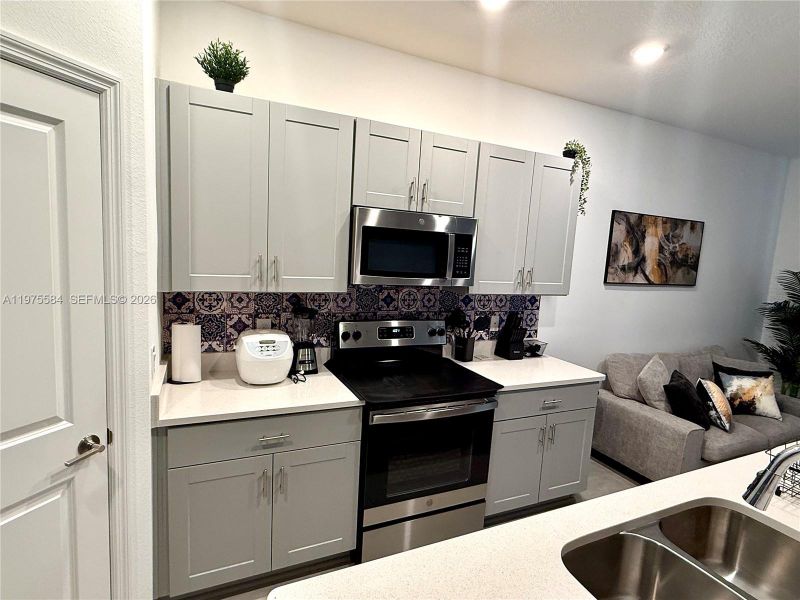 Furnished interior view inside a new home in , Kissimmee (Image 10).