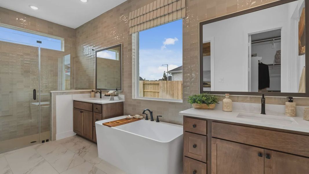 Representative furnished interior of a home built from the Acadia by Chesmar Homes in Elyson 50's, Katy (Image 21).