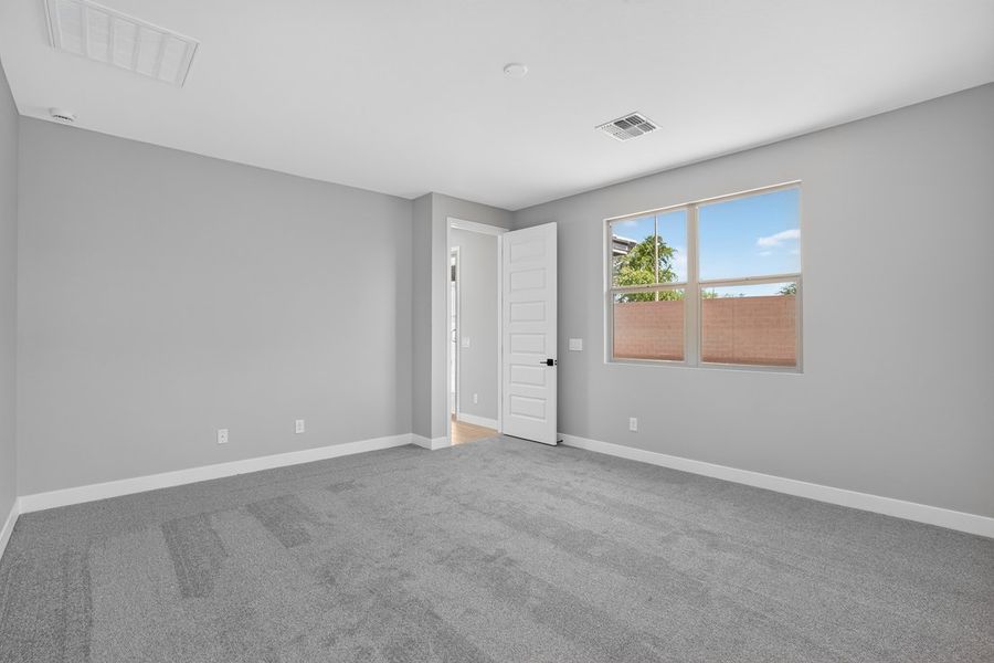 Spacious, unfurnished interior of a new home in Artisan at Asante, Surprise (Image 15).
