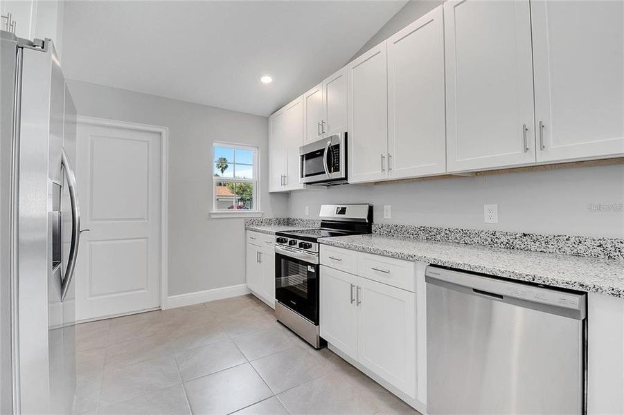 Furnished interior view inside a new home in , Kissimmee (Image 5).