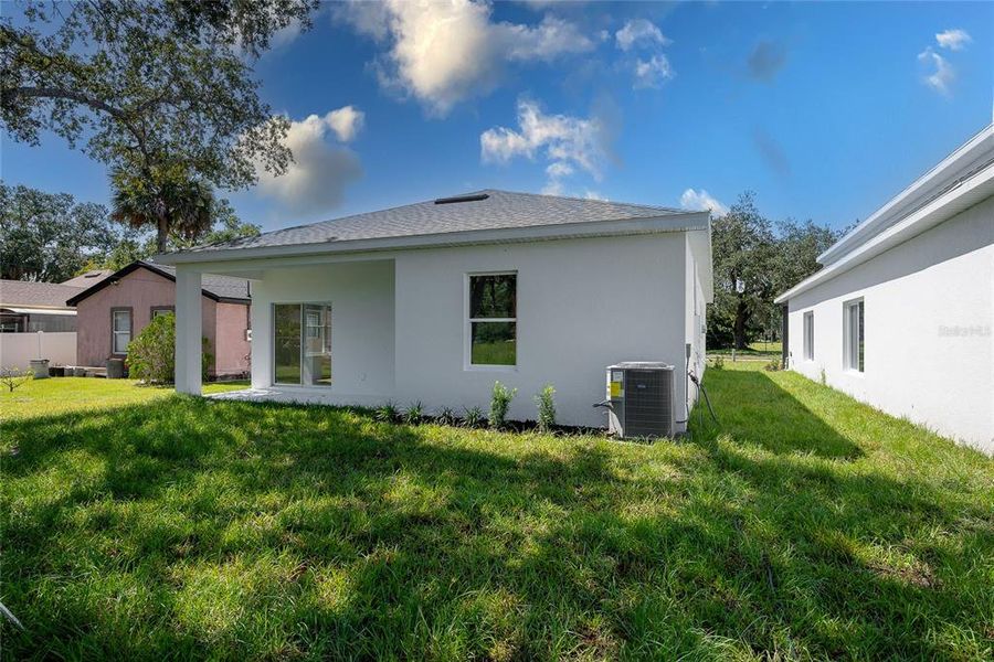 Front exterior of a new home in , Sanford, FL, highlighting curb appeal (Image 17).