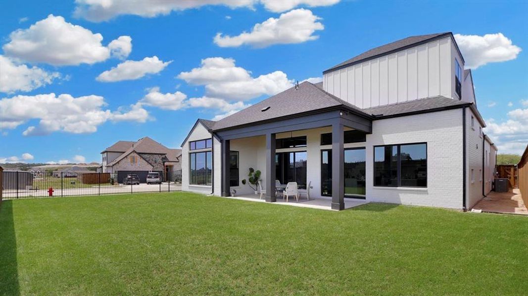 Exterior details and patio area of a home in Rio Vista at Kelly Ranch, Aledo (Image 3).