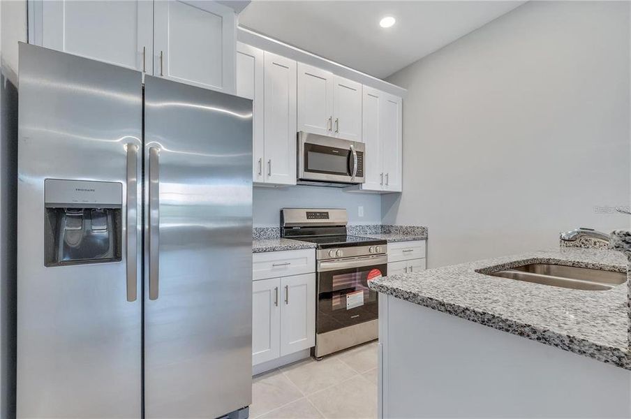 Furnished interior view inside a new home in , Kissimmee (Image 8).