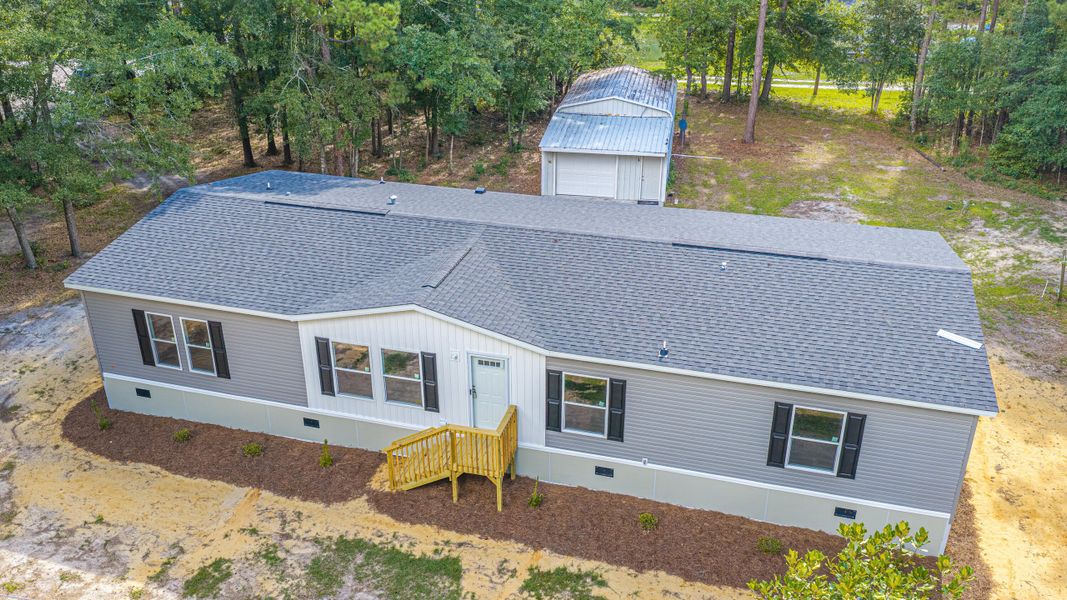 Exterior details and patio area of a home in , Walterboro (Image 26).