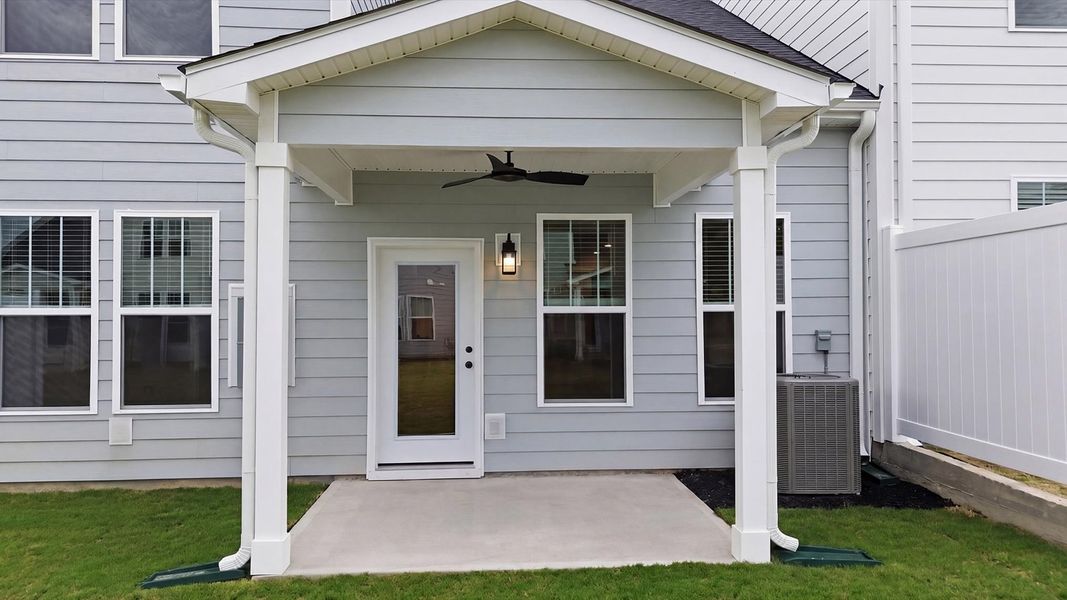 Warm and inviting outdoor living space with a covered rear porch and tasteful finishes located in Anderson, SC Warm and inviting outdoor living space with a covered rear porch and tasteful finishes located in Anderson, SC