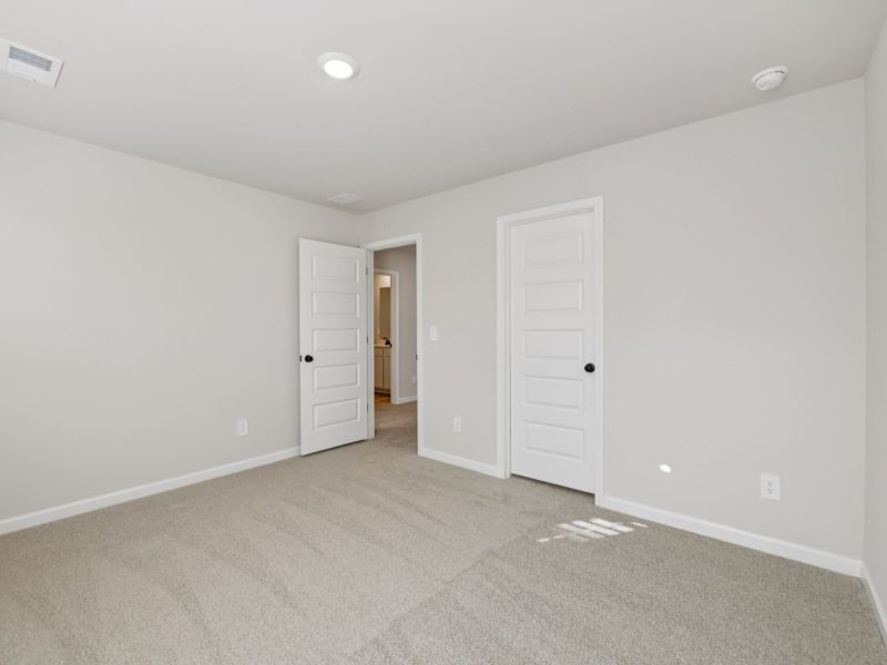 The Taylorsville floorplan with the Divine White interior package.