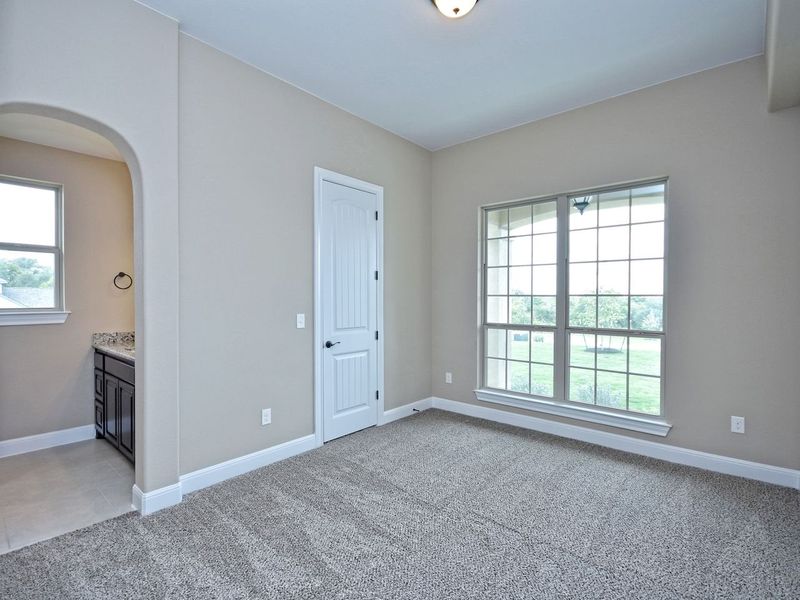 Representative unfurnished interior of a home built from the Madera II by Giddens Homes in Scofield Farms Estates, Georgetown (Image 360).