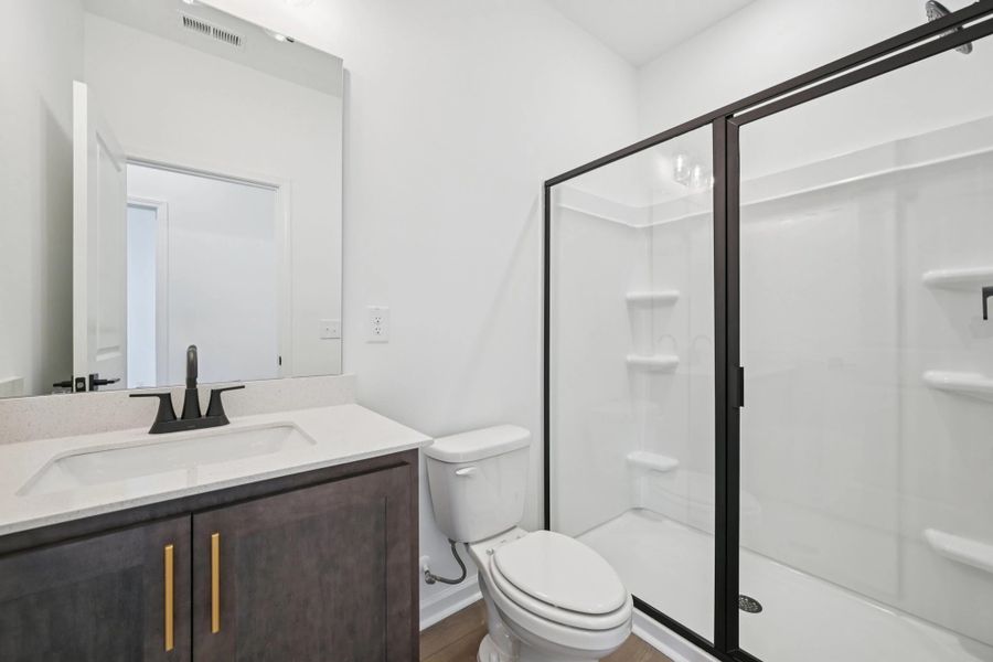 Guest Bath featuring AW Collection® Oxford - Clean finishes and calming hues.