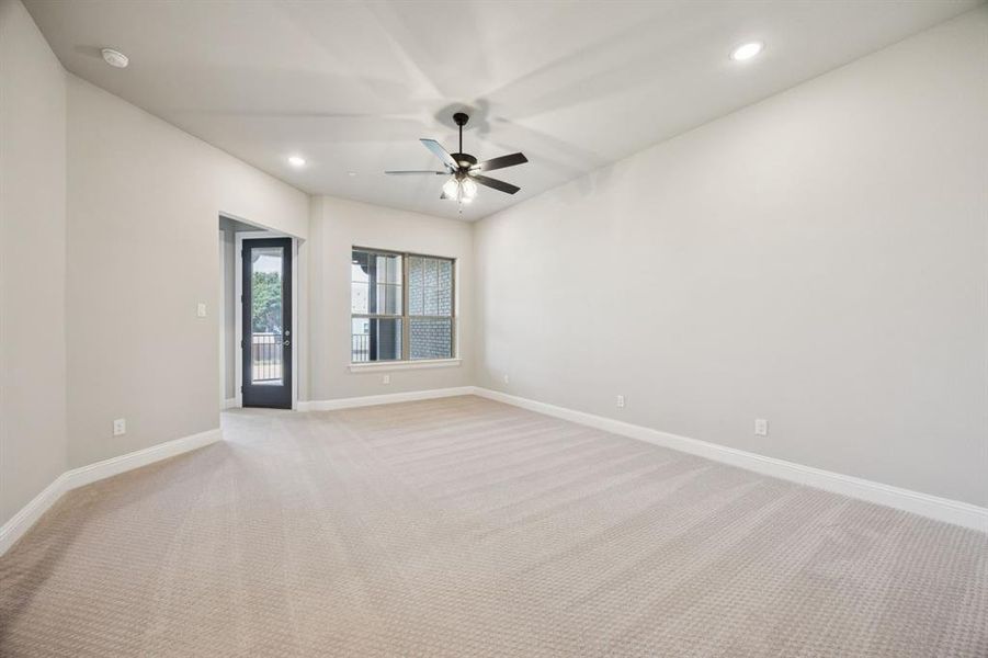 Game room looking out towards second floor balcony.