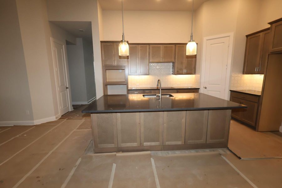 In-progress construction of a new home in Sienna - Landmark Row Collection, Missouri City, TX (Image 6).