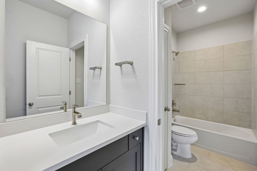 Furnished interior view inside a new home in 6 Creeks, Kyle (Image 13).