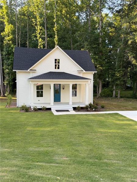 Front exterior of a new home in , Bowdon, GA, highlighting curb appeal (Image 20).