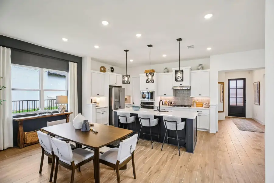 Furnished interior view inside a new home in Bridgeland, Cypress (Image 18).
