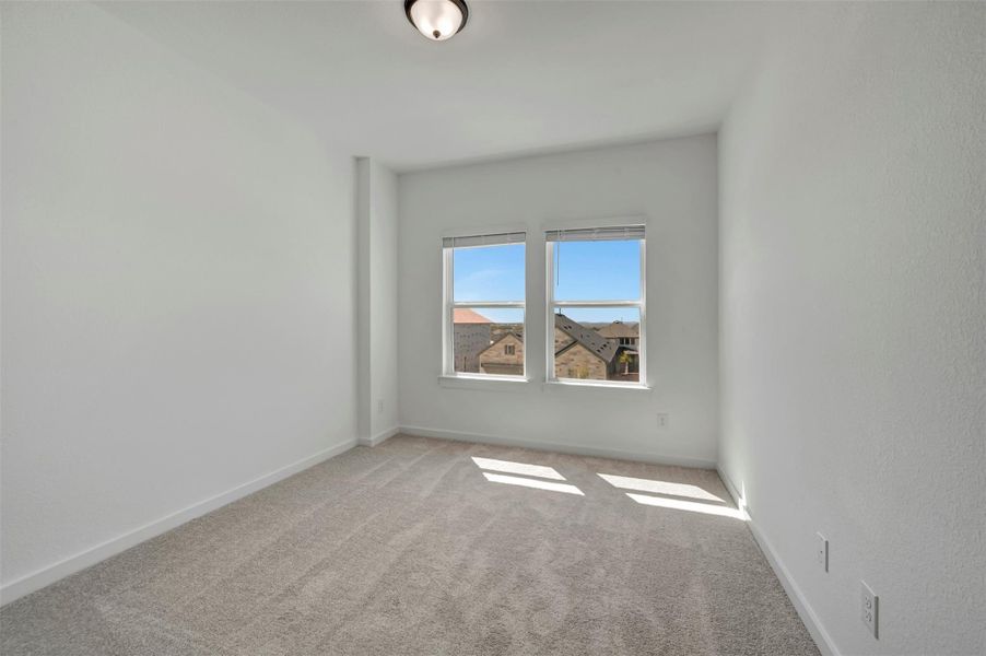 Spacious, unfurnished interior of a new home in Heritage, Dripping Springs (Image 11).