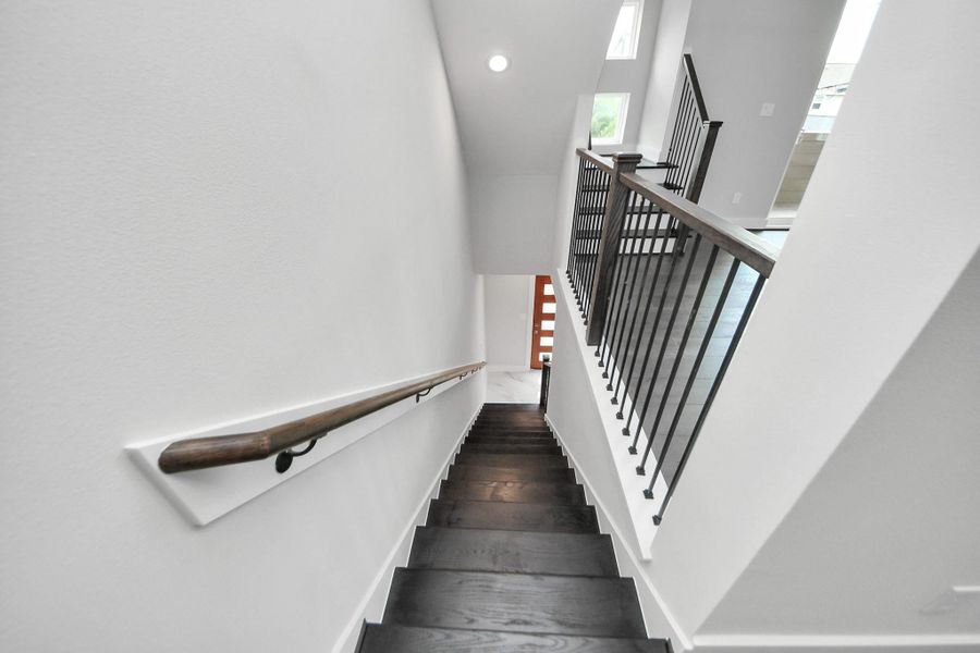 Staircase detail connecting all three levels