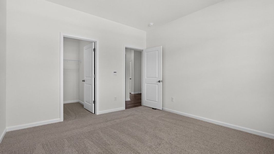 Spacious, unfurnished interior of a new home in The Reserve at Prestleigh, Wake Forest (Image 21).