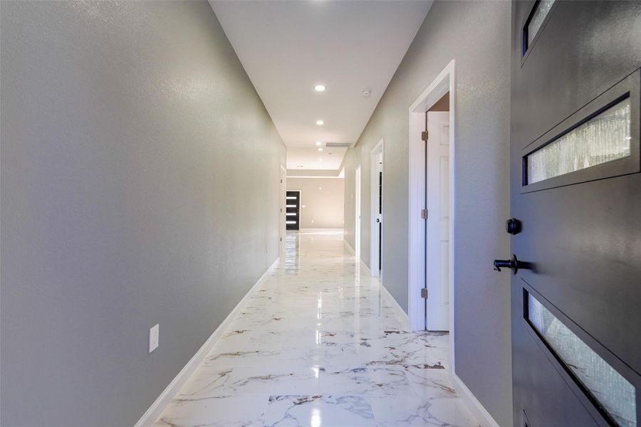 entry with a widen long hallway