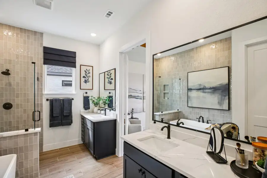 Furnished interior view inside a new home in Bridgeland, Cypress (Image 26).