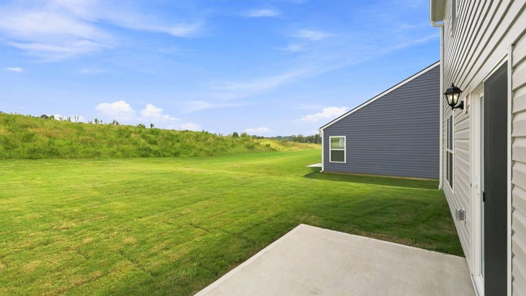 Exterior details and patio area of a home in Tyger Pines, Moore (Image 19).