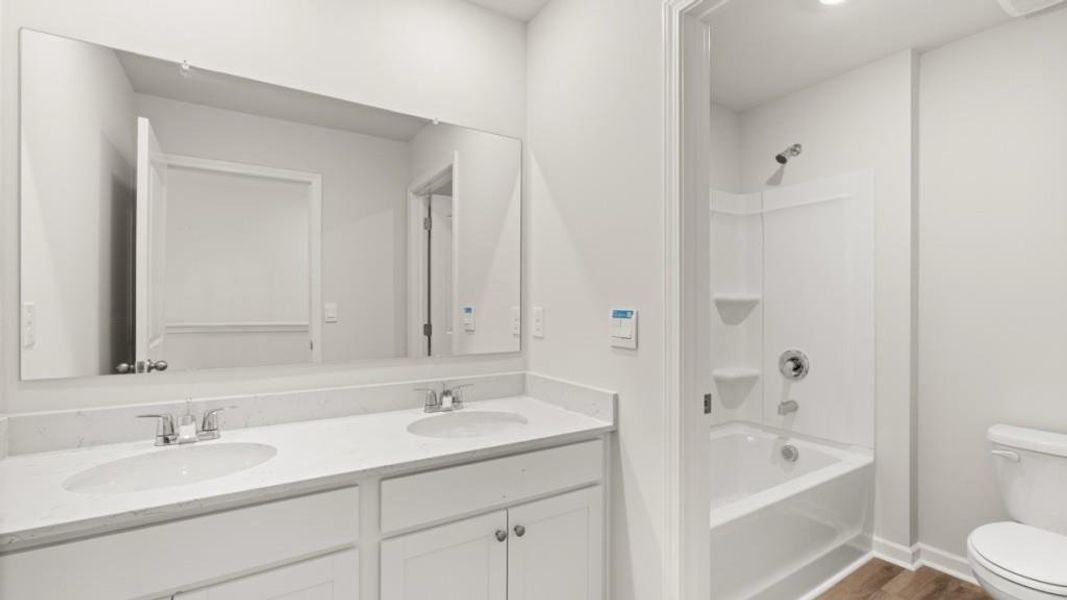 Furnished interior view inside a new home in Braselton Village, Braselton (Image 9).