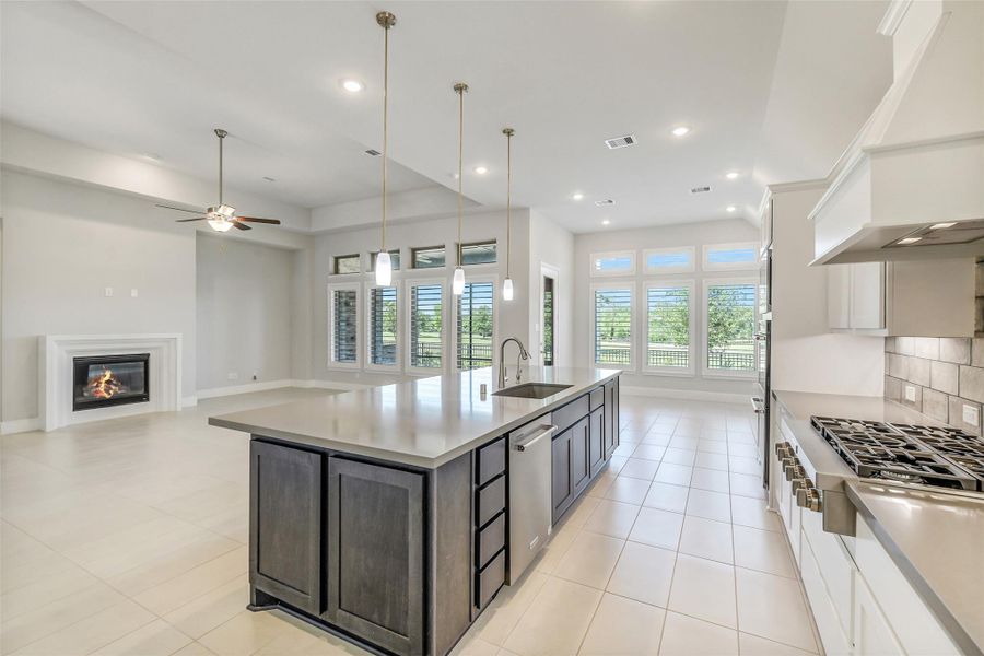 Can you imagine making meals in this kitchen. It is well thought out and the spacing makes it convenient to move from cook top to oven. The corner cabinet has a lazy susan. The counter tops are Omega Stone Countertop with eased corners. Can you imagine making meals in this kitchen. It is well thought out and the spacing makes it convenient to move from cook top to oven. The corner cabinet has a lazy susan. The counter tops are Omega Stone Countertop with eased corners.