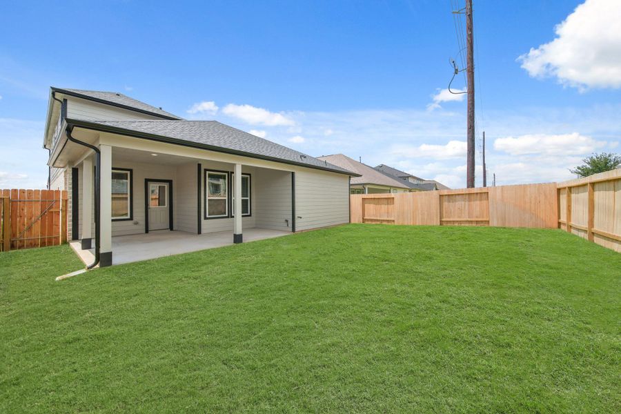 Front exterior of a new home in Morton Creek Ranch, Katy, TX, highlighting curb appeal (Image 13).