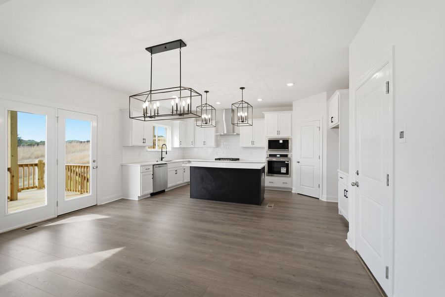 Furnished interior view inside a new home in McCain's Station, Gallatin (Image 7).