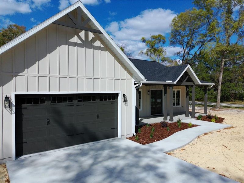 Front exterior of a new home in , Chiefland, FL, highlighting curb appeal (Image 30).